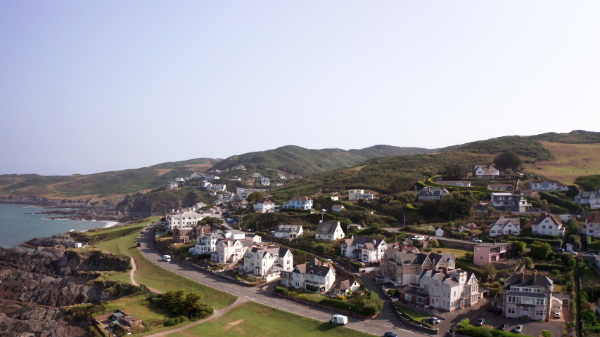 Aerial Fly Away from an Esplanade in North Devon Revealing the Golden Beach Below