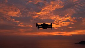 Drone flying over sunset colorful sky with cloud, Sport recreation technology