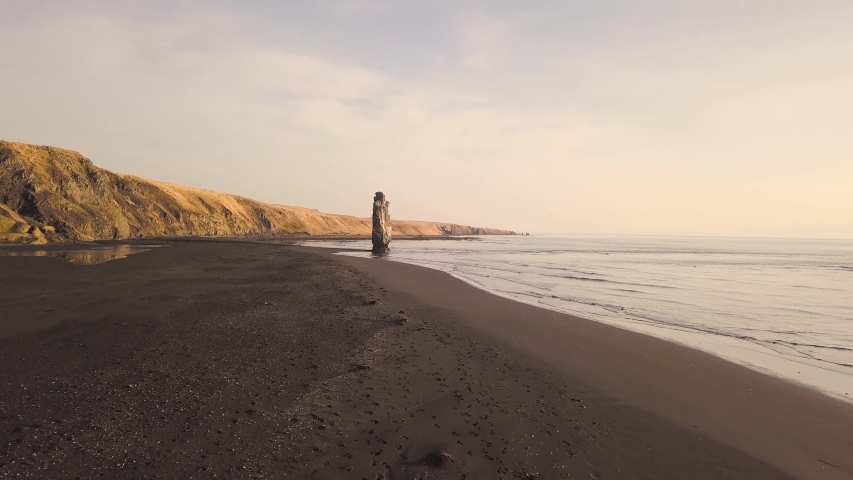 Drone shots of Hvitserkur rock in Iceland. Many angles of the special rock formation in perfect sunrise light. Shot in 4k with the DJI MavicPro.