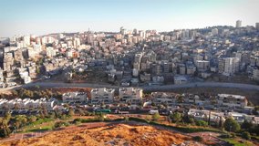 Palestinian Town Behind concrete Wall Aerial view
Flying over Palestinian Town Shuafat Close to Jerusalem Drone footage 