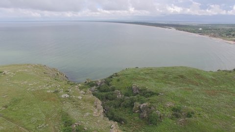 Aerial view of Azov sea coast near cape Kazantip, Crimea on overcast day.