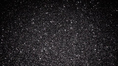 
Black Sparkling Obsidian Glitter. Seamlessly looping animated background.