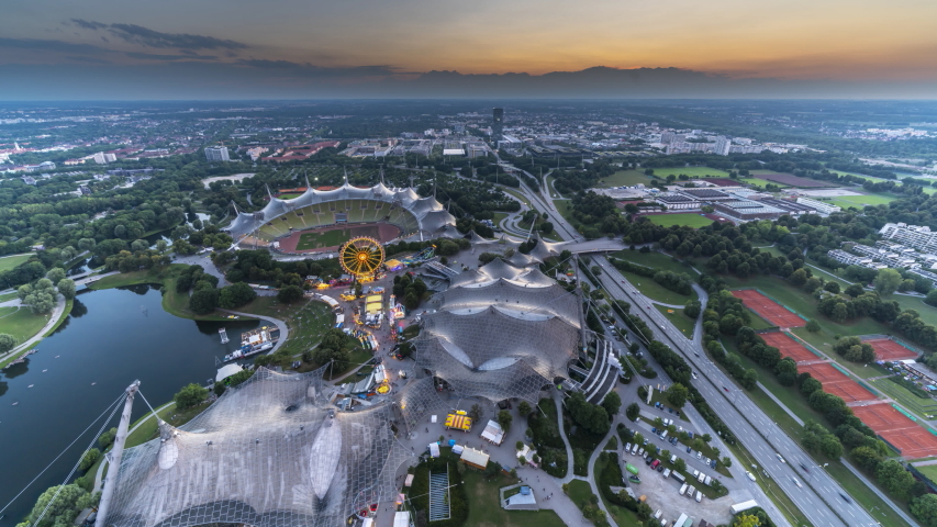 Munich skyline aerial view time lape from day to night in 4K.