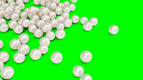 Falling and rolling pearls on a surface isolated on a green background. Jewelry pearl beads. Brilliant oyster pearl balls for luxury accessories. Brilliant sea pearls. 3D 4K animation