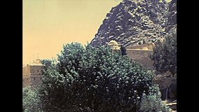 panorama of Saint Catherine Monastery cloister walls in the Sinai Peninsula, Christian Monastery of Egypt. Archival Mount Sinai of Egypt in 1970s during Israeli occupation until 1979.