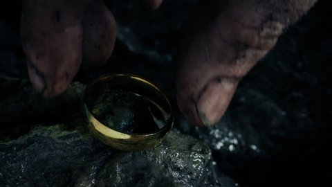 Magic Ring Is Picked Up Off Rocks