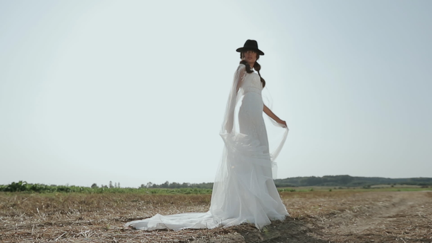 white floppy hat wedding