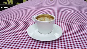 A cup of tea on a tablecloth in a kitchen - Powered by Shutterstock - Get 15% off with code: PIKWIZARD15
