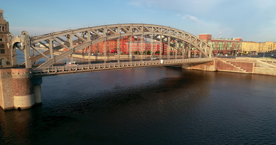Bolsheokhtinsky bridge across Neva River in summer day, also known as Peter the Great Bridge, Saint-Petersburg, Russia