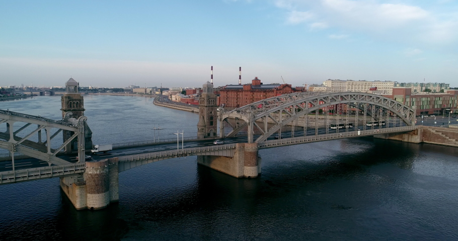 Bolsheokhtinsky bridge across Neva River in summer day, also known as Peter the Great Bridge, Saint-Petersburg, Russia
