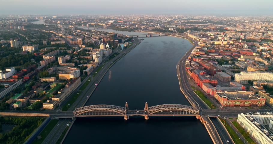 Bolsheokhtinsky bridge across Neva River in summer day, also known as Peter the Great Bridge, Saint-Petersburg, Russia