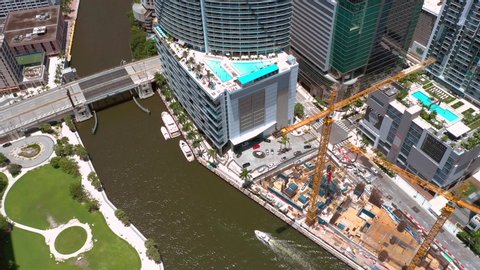 Miami, FL, USA - July 27, 2019: Aerial photo Epic Downtown Miami on the river 4k