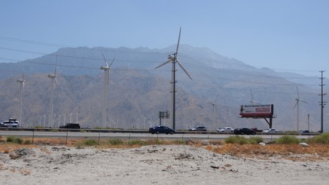 Palm Springs,California/USA - 7/06/2019: Day Shot of Palm Springs wind turbines generating clean energy in the background.