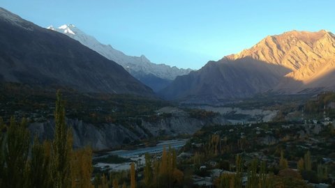 Hunza Valley, Northern Pakistan at Sunrise. This is a panning shot that shows the whole valley and it's unique beauty