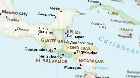Guatemala, Honduras, and Nicaragua on a political map of the world. Video defocuses showing and hiding the map (4K UHD).