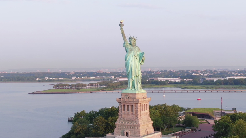 Slow cinematic aerial Staute of Liberty; cinematic; 4k; sunny morning. | Shutterstock HD Video #1034447711