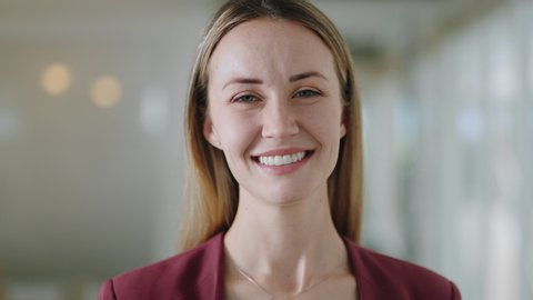portrait happy caucasian business woman smiling enjoying successful career proud entrepreneur in office workplace testimonial 4k footage