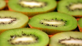 Slider view of kiwi fruit fresh slices on a table in a kitchen