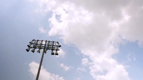 close up Time Lapse of Stadium Lights with clouds passing overhead