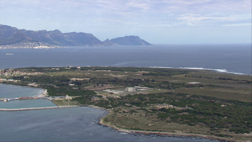 Flying around Robben island, Cape Town in the background.
