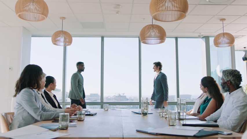 business people handshake in boardroom meeting successful corporate partnership deal executives shaking hands colleagues clapping hands welcoming opportunity for cooperation in office 4k Royalty-Free Stock Footage #1034473058