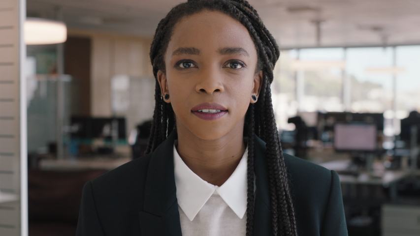 portrait african american business woman smiling confident manager in corporate office beautiful female executive enjoying successful career in management professional at work