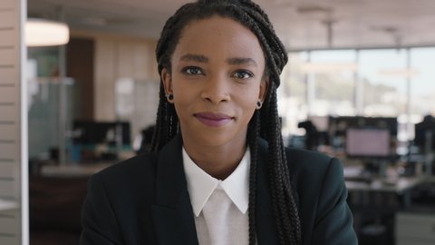 portrait african american business woman smiling confident manager in corporate office beautiful female executive enjoying successful career in management professional at work