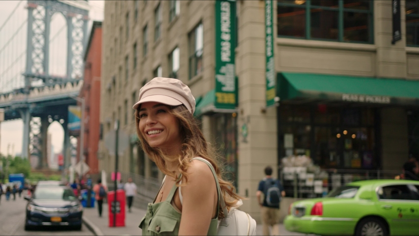 French tourist walks around Brooklyn and enjoying it, famous view on Manhattan Bridge, first time in New York, traveler's life. Royalty-Free Stock Footage #1034485319