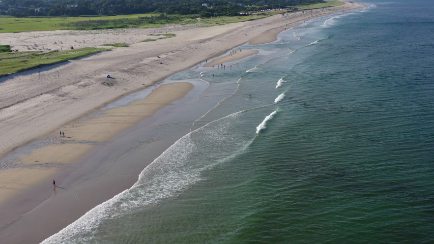 The cold waters of the Atlantic Ocean bathe a scenic beach on Cape Cod, Massachusetts. This beautiful area of New England, not too far from Boston, is a popular summer vacation destination.