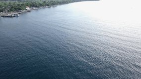 aerial video of flying over the beach in Bali