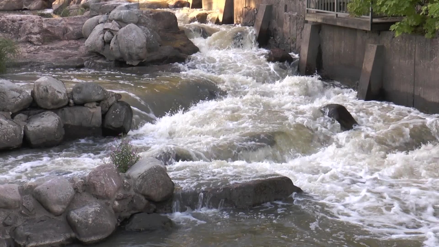 Helsinki, Finland. Cascades and shallows of the river Vantaa. Warm summer  evening.