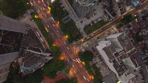 twilight illuminated shenzhen city downtown traffic street aerial topdown panorama 4k china