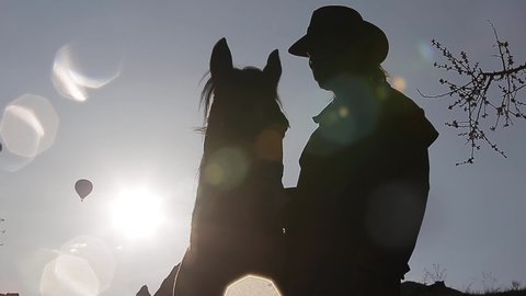 Nevsehir, Cappadocia / Turkey - Nowember 10 2015: a cowboy training his horse
