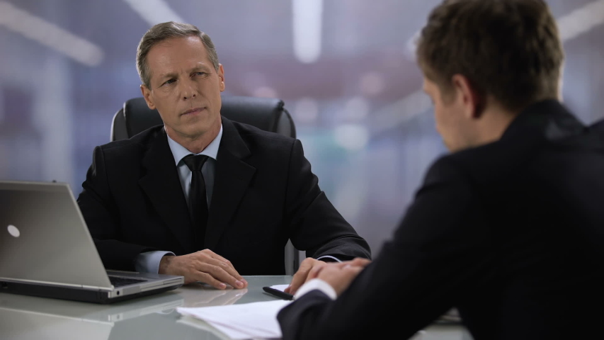 Arrogant male hirer listening applicant during job interview and laughing, fail Royalty-Free Stock Footage #1034541443