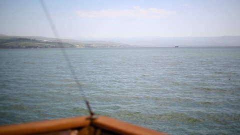 Pull focus to front of boat on Sea of Galilee
