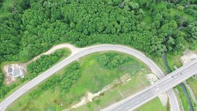 Video 4k from drone air green field road to travel as a map.