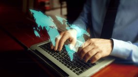 Hacker typing on laptop with world map hologram over keyboard. Futuristic concept of globalization, worldwide network, international business and social media connection. Hand camera shake. - Powered by Shutterstock - Get 15% off with code: PIKWIZARD15