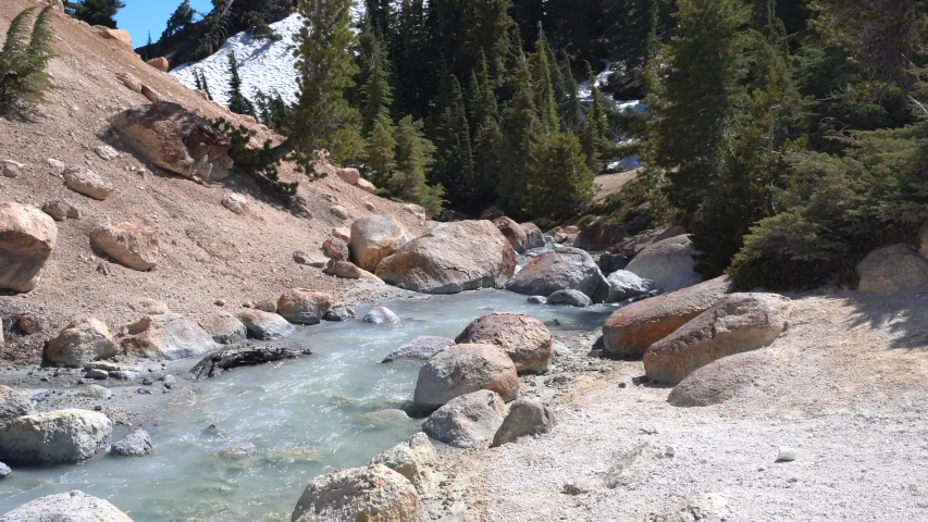 4K video of Bumpass Hell in Lassen Volcanic National Park, California - July 28, 2019. A popular tourist destination famous for geothermal features.