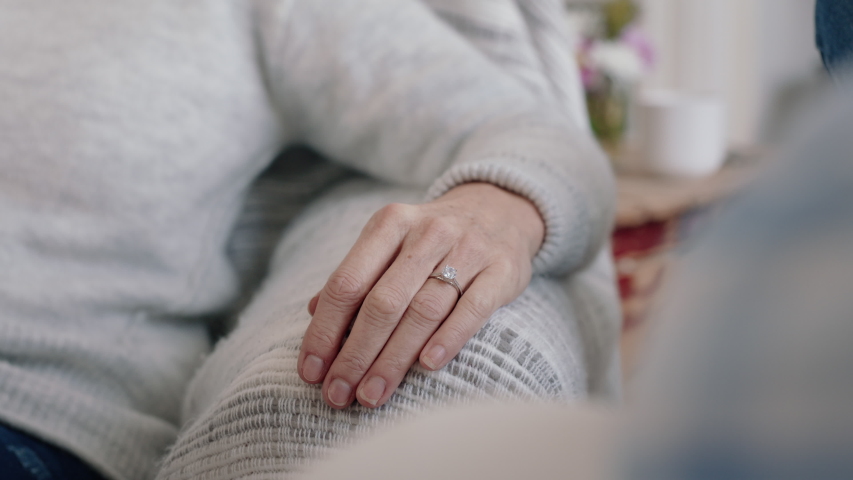 Close up old couple holding hands gently touching sharing romantic connection expressing love after long marriage kindness forgiveness concept 4k footage | Shutterstock HD Video #1034608475