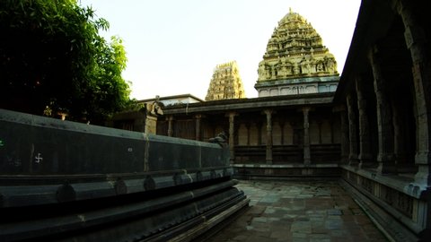 stone yard of ancient hindu temple Ekambareswarar with column and big towers with sculptural composition Linga of Earth element Kanchipuram Dravidian style 