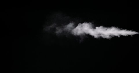 Real white smoke isolated on black background with visible droplets