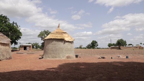 West Africa - August 5, 2019: A view of a village with huts.