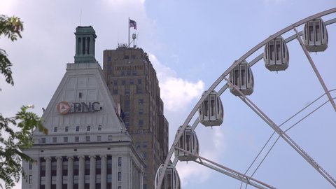 CINCINNATI, OHIO - JUNE 29: PNC bank building and Skystar Ferris Wheel downtown Cincinnati, Ohio on June 29, 2019.