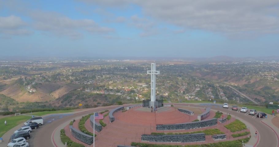 Aerial Wrap Around of Memorial Cross with Ocean on top of La Jolla Mt Soledad in San Diego California