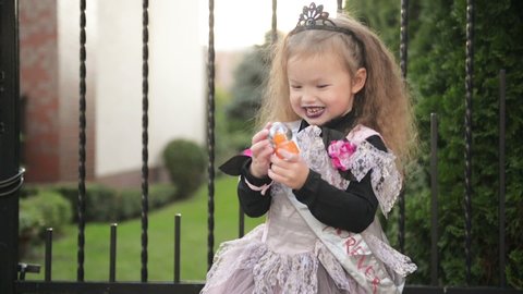 Beautiful Girl In Witch Costume Celebrate Halloween Outdoor And Have A Fun.