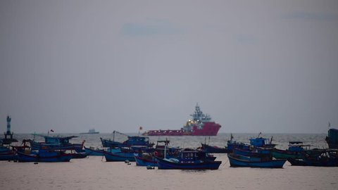 several ships and boats are at an anchor at the Vungtau city port, Vietnam