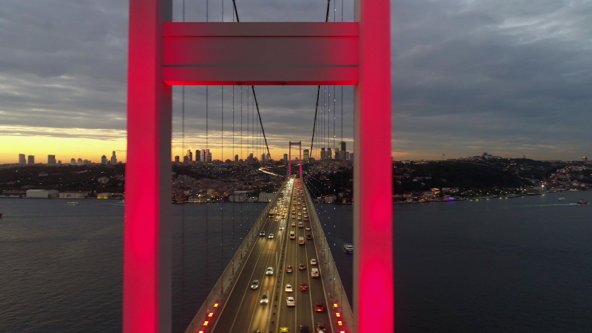 Aerial view of sunset on Istanbul Bosphorus Bridge (15 July Martyrs Bridge). 4K Footage in Turkey | Shutterstock HD Video #1034684222