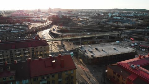 Gothenburg , Vastra Gotaland / Sweden - 04 01 2019: Aerial footage showing parts of Olskroken and Gamlestan, Also showing road E20, a moving tram, train and cars. Gothenburg, Sweden.