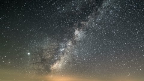 Milky way galaxy stars in starry sky Time lapse Day to night