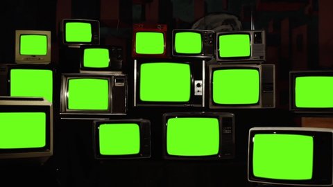 Stacked Vintage TVs Turning Off Green Screens. Zoom Out. You can replace green screen with the footage or picture you want with “Keying” effect in AE (check out tutorials on Internet).